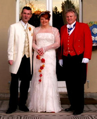 Toastmaster Richard Palmer with bride and bridegroom